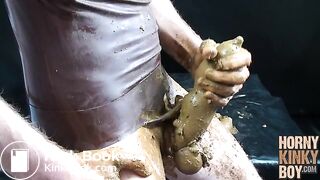 Scat Lover in Brown Rubber Eats and Plays Around