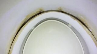 Pissing girlfriend in public toilet (view from toilet)