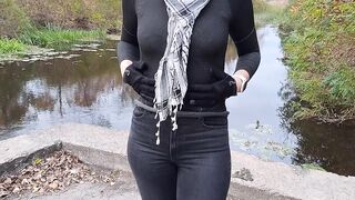Girl masturbates in a park near the river