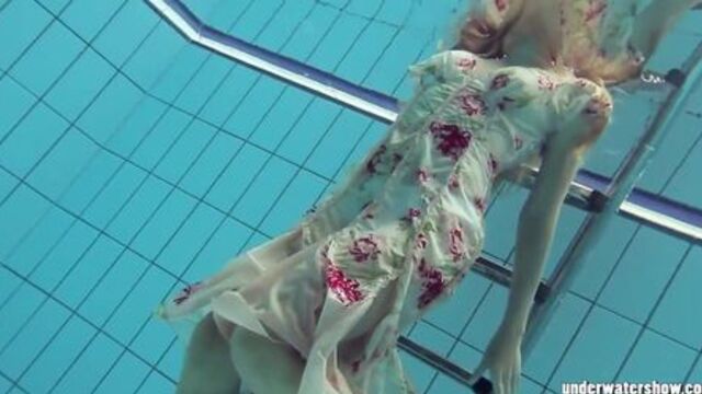 Beautifully dressed underwater girl Lucy Gurchenko