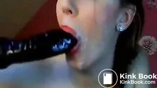 Hot chick makes herself gag on a big toy