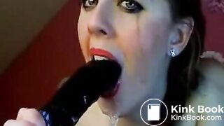 Hot chick makes herself gag on a big toy