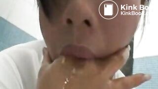 Asian woman pukes and gives handjob