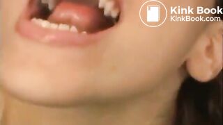 Close up of mouth and gagging
