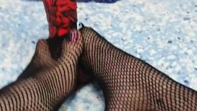 Amatuer teen gives foot job in fishnets