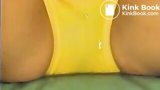 Japanese Bloomers - Pissing in yellow bloomers