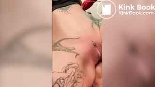 Tattoed slut feeds her Slave some shit