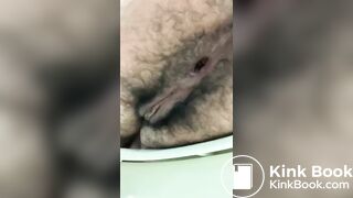 Extremely hairy girl shitting