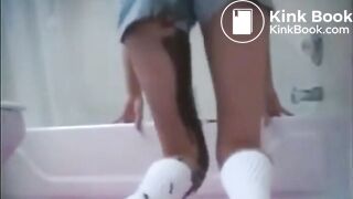 Diarrhea in shorts runs down her leg