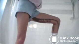 Diarrhea in shorts runs down her leg