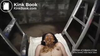 A woman covered in shit and licking anal.
