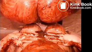 Two hot girls covering his cock with shit