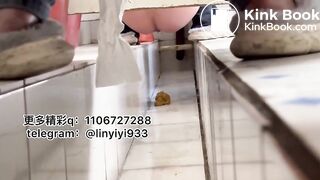 Beautiful woman pooping in the toilet