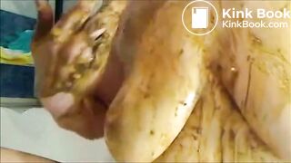 woman smearing shit on boobs