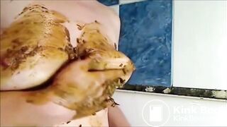 woman smearing shit on boobs