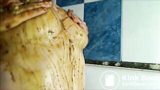 woman smearing shit on boobs