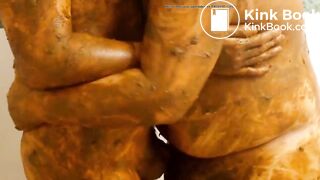 two shit covered gay guys hugging