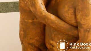 two shit covered gay guys hugging