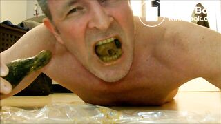 older guy eating shit off a dildo