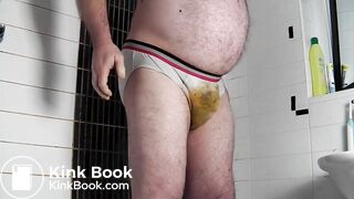 scat bear smearing his big belly