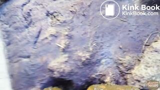 Outside the cow barn - couple in cowshit