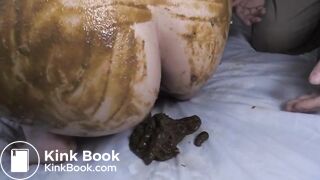 Shitting and pissing on her