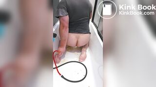 Crossdresser's shitty enema play