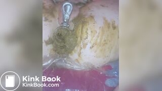 wretchedCunt being filled with shit like a pig