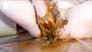 masturbating and fisting pussy with shit