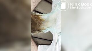 Hairy femboy opens messy diaper and begins to mast