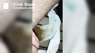 Hairy femboy opens messy diaper and begins to mast