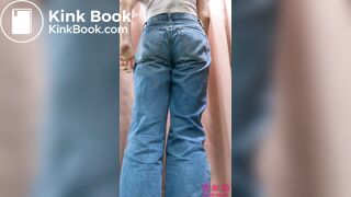 Big school girl peeing in jeans