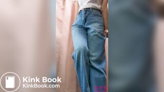 Big school girl peeing in jeans