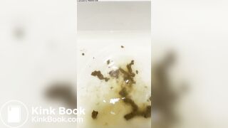 Smelly gal scoops her poop from the shower water