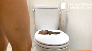 She’s squeezing out a healthy turd on her toilet seat