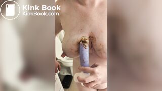 Nervously smearing her dirty dildo on her tits