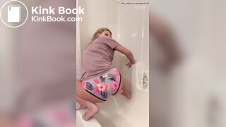 Blackras poops her panties squatted over bathtub