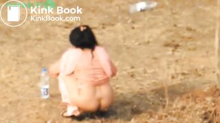 Woman pooping in public - video 2