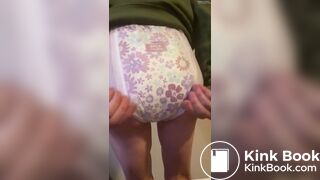 Diaper Girl messes diaper