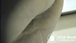 Moaning lady spreads her ass to take a huge sticky poop