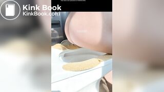 A plump buttock defecating on the toilet.