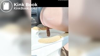 A plump buttock defecating on the toilet.