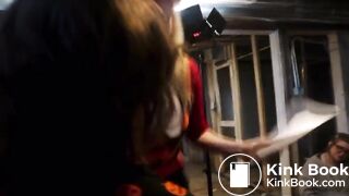 A women poops in a prop toilet during her audition