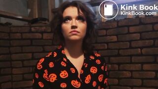 A women poops in a prop toilet during her audition