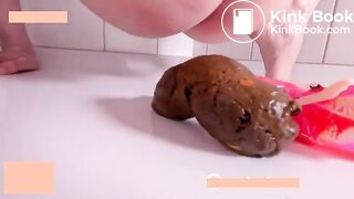 Lady using her Barbie doll for dirty anal scat play