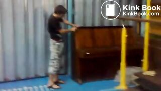 Naughty guy shits into the piano