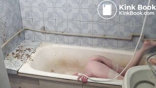 Girl take enema in bathroom