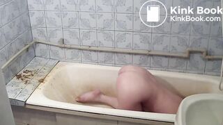 Girl take enema in bathroom