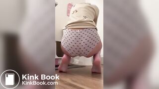 Doing a poo in her big panties