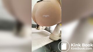 A girl defecated and urinated in a public toilet.